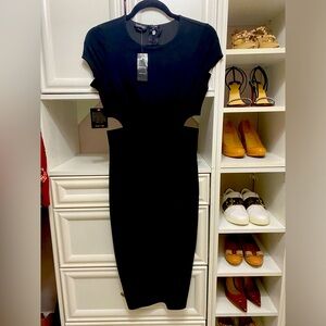 Bebe black evening dress with side cutout detail.